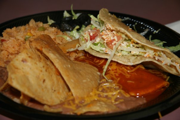 The sought-after taco enchilada at El Indio, San Diego