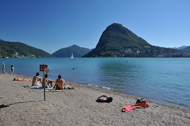 Swimming and sunbathing in Lugano, Switzerland