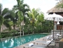 Square_kayana_seminyak_bali_review-main_pool_and_lounge_chairs