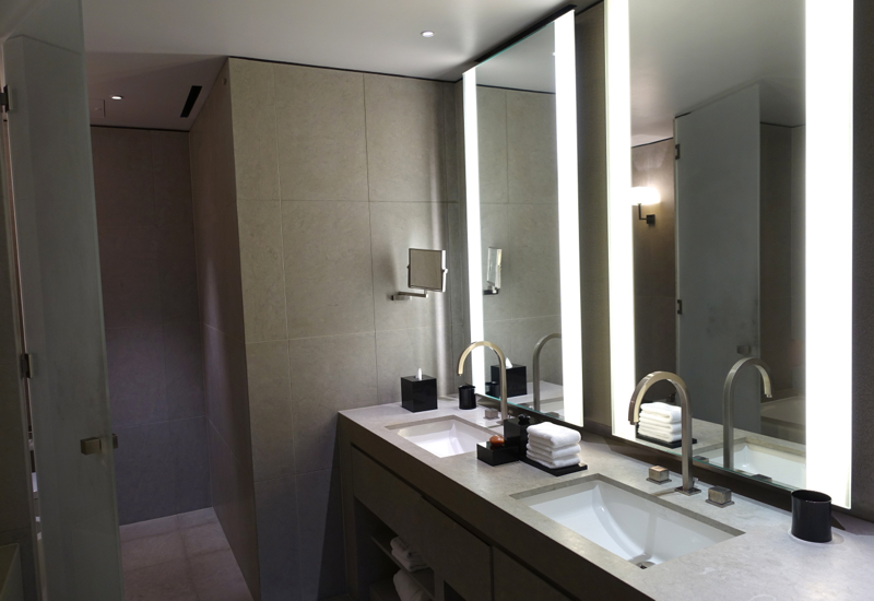 Armani Premier Suite Bathroom with Dual Vanities and His and Hers Sinks