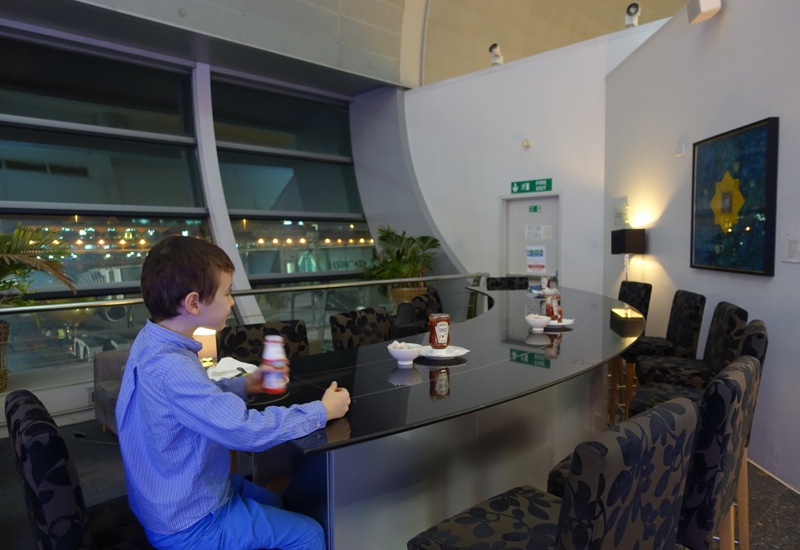 British Airways Galleries Lounge Dubai-Curved Bar and View of Tarmac