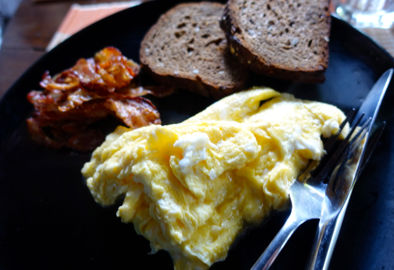 Scrambled Eggs and Bacon at Amansara's Khmer Village House