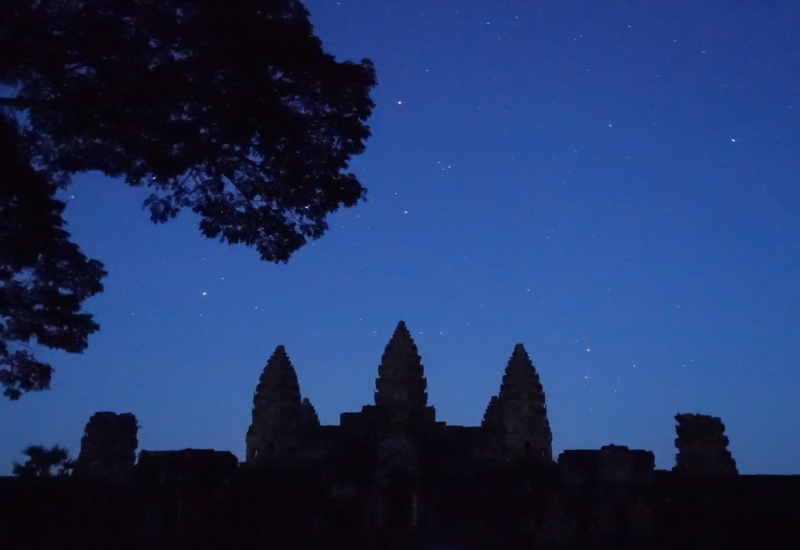 Angkor Wat at Night Under Starry Sky