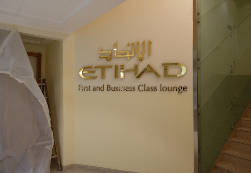 Review: Etihad First and Business Class Lounge Abu Dhabi Terminal 1 Sign