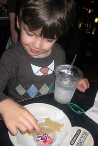 Decorating a cookie at Blue Smoke, New York