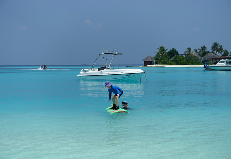 Surfing in the Maldives: Learning to Stand on the Surfboard