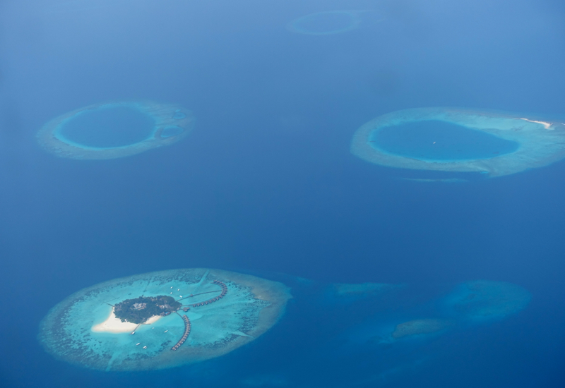 View of Atolls from Trans Maldivian Seaplane, Maldives