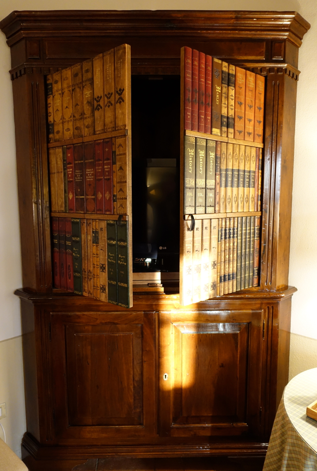 TV Hidden Behind Faux Bookcase, Castello Banfi Il Borgo Review