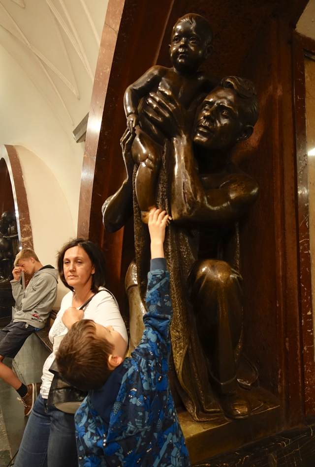 Rubbing a Bronze Statue at Ploshchad Revolyutsii for Good Luck