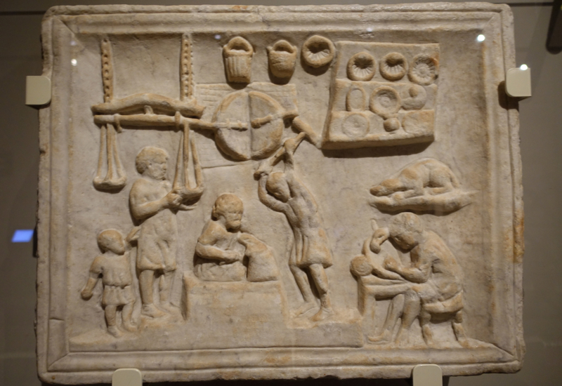 Marble Bas Relief of a Busy Coppersmith's Workshop, ROM Pompeii Exhibit Toronto Review