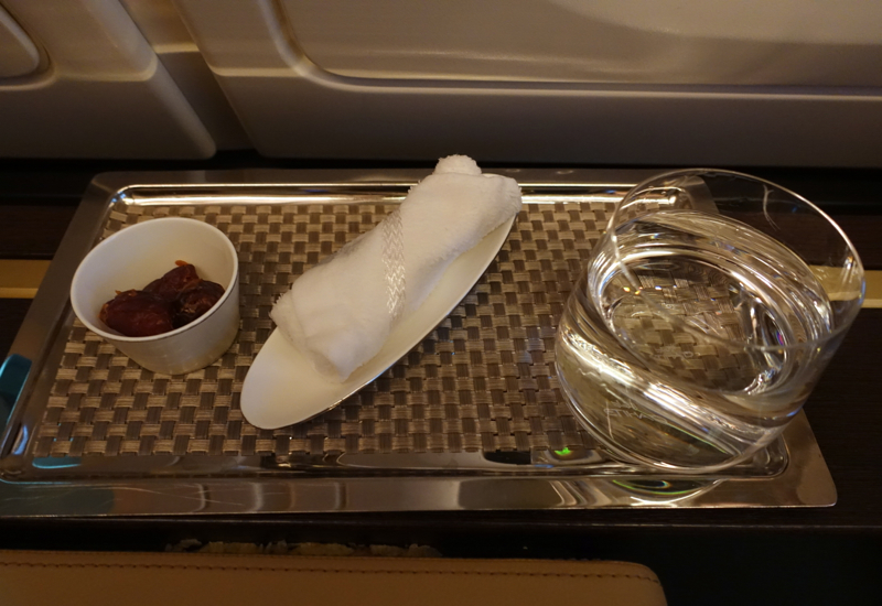 Pre-Flight Drink, Dates, Refreshing Towel, Etihad First Apartment Review
