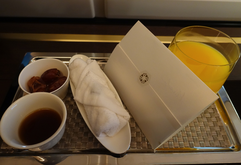 Etihad First Class Pre-Flight Arabic Coffee, Dates, Refreshing Towel