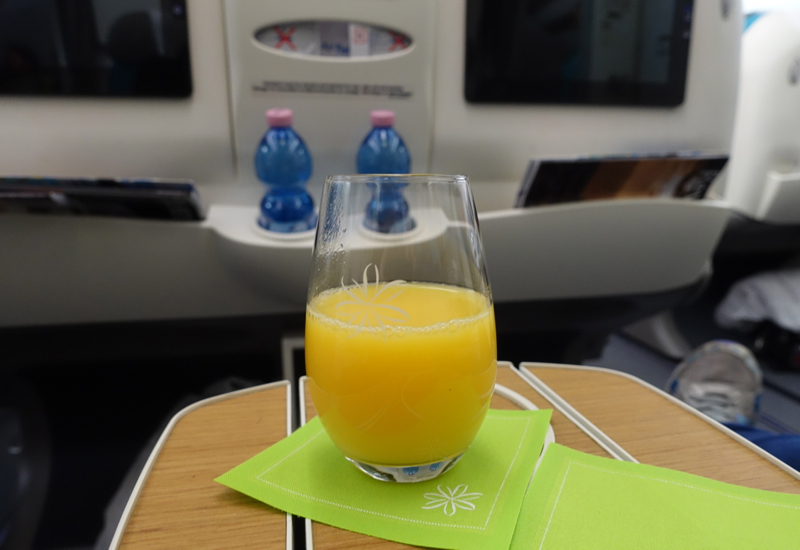 Pre-Flight Drink of Orange Juice, Air Tahiti Nui Business Class Review