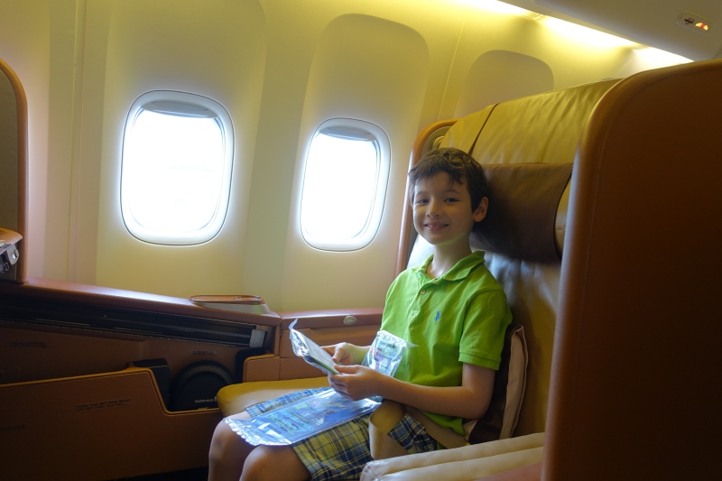 Enjoying Seat 1F, Singapore First Class Review, 777-300ER