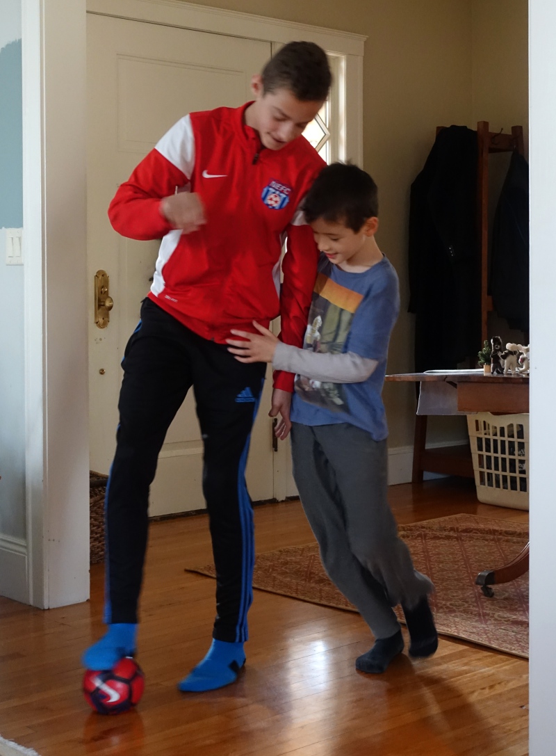 Cousins Playing Indoor Soccer 