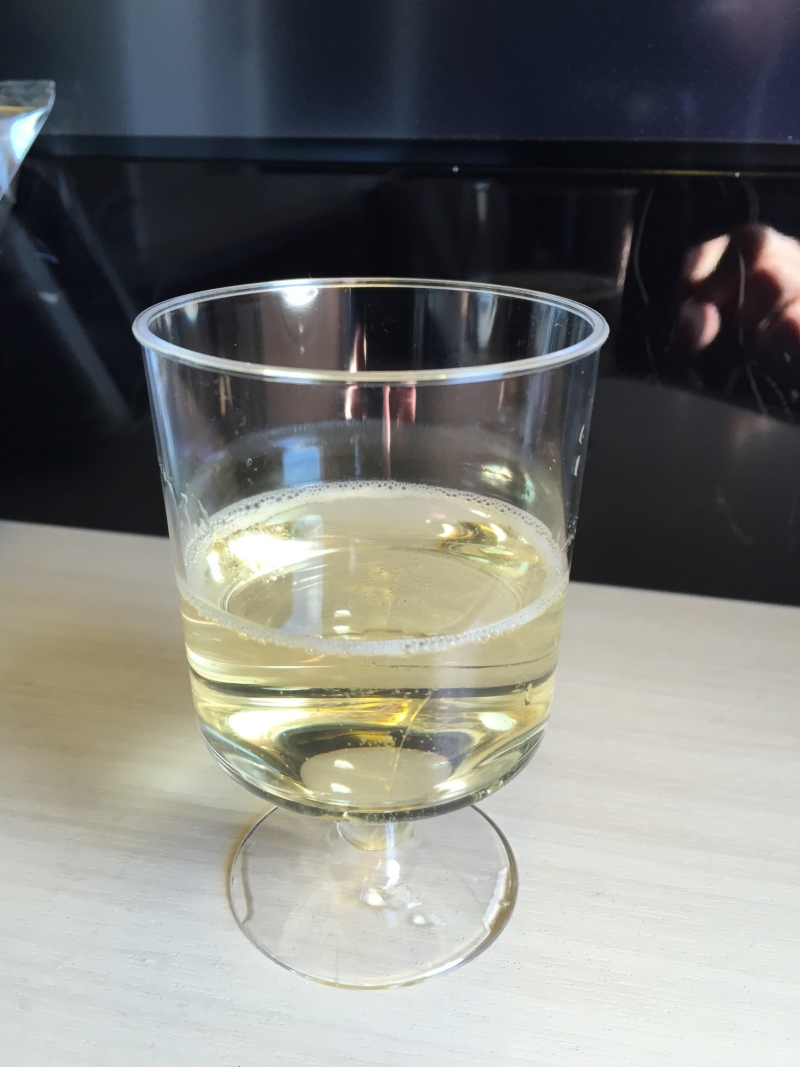 Pre-Flight Drink of Champagne, Japan Airlines Business Class Review