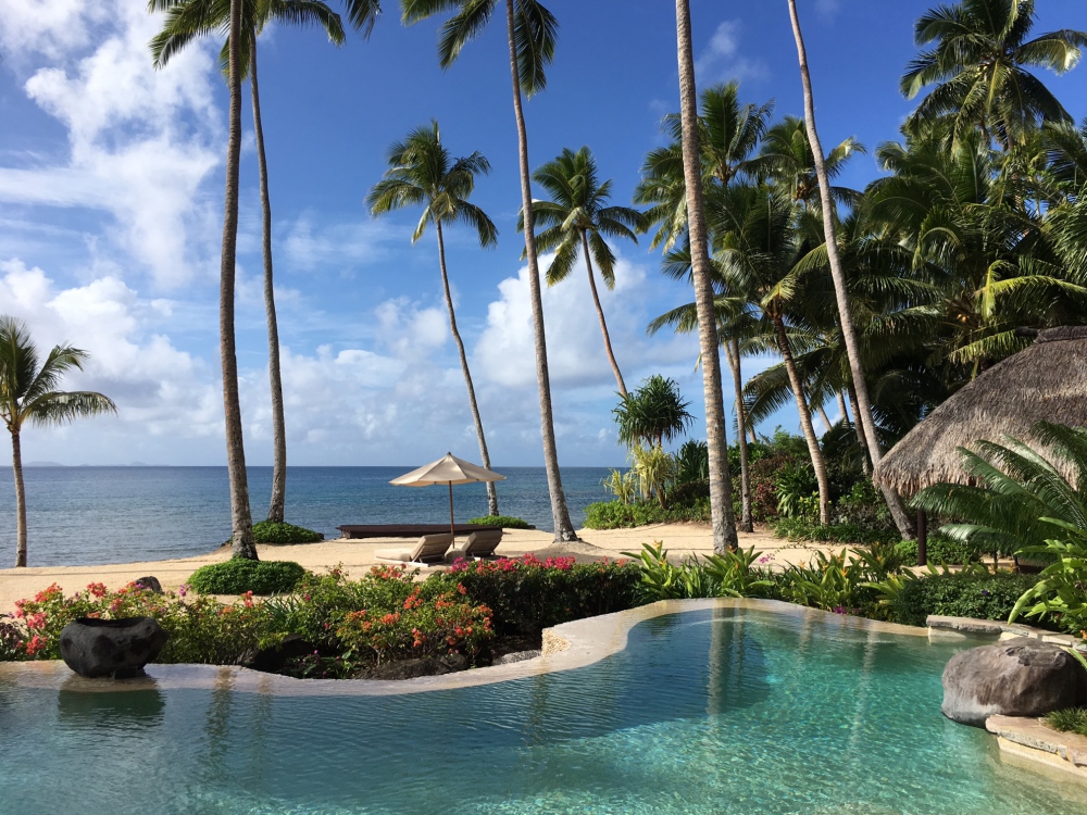 Laucala's Free Form Pool is Steps from the Beach