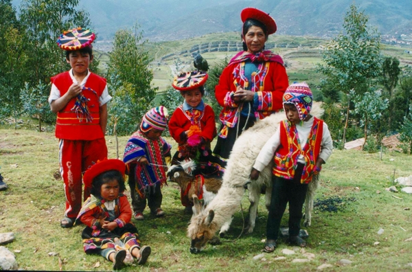 Family in traditional dress, Machu Picchu