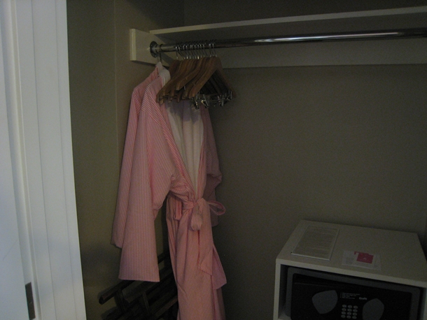 The Royal Hawaiian Hotel Review-Closet with pink and white Frette robes