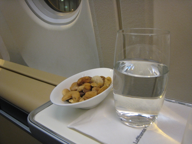 Lufthansa New First Class Review - Pre-flight drink and nuts