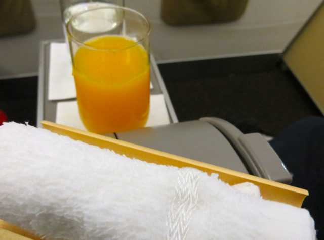 Etihad Business Class Review Male to Abu Dhabi - Cool Towel and Fresh Squeezed Orange Juice