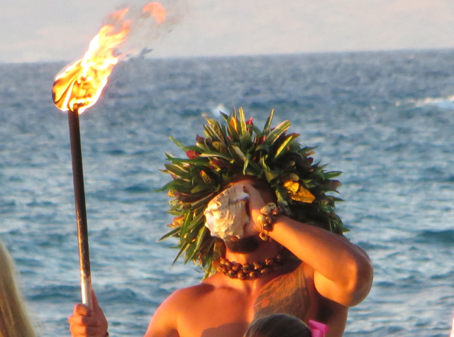 Conch Blowing in front of 'ULU Ocean Grill